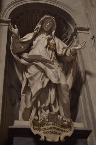 St. Catherine of Siena is often depicted with the stigmata in religious art, such as the above sculpture. 