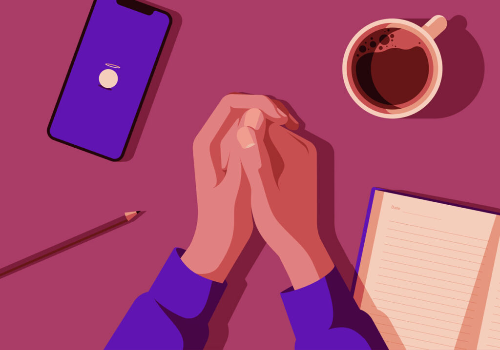 An animated illustration showing a pair of hands clasped together on a table, with the Hallow app, a pen and notebook, and a cup of coffee