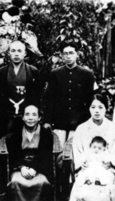 The Nagais posing for a photo with Makato and their relatives